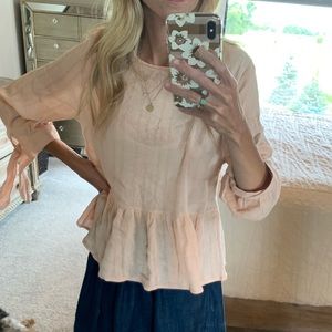 Light pink peplum ruffle top